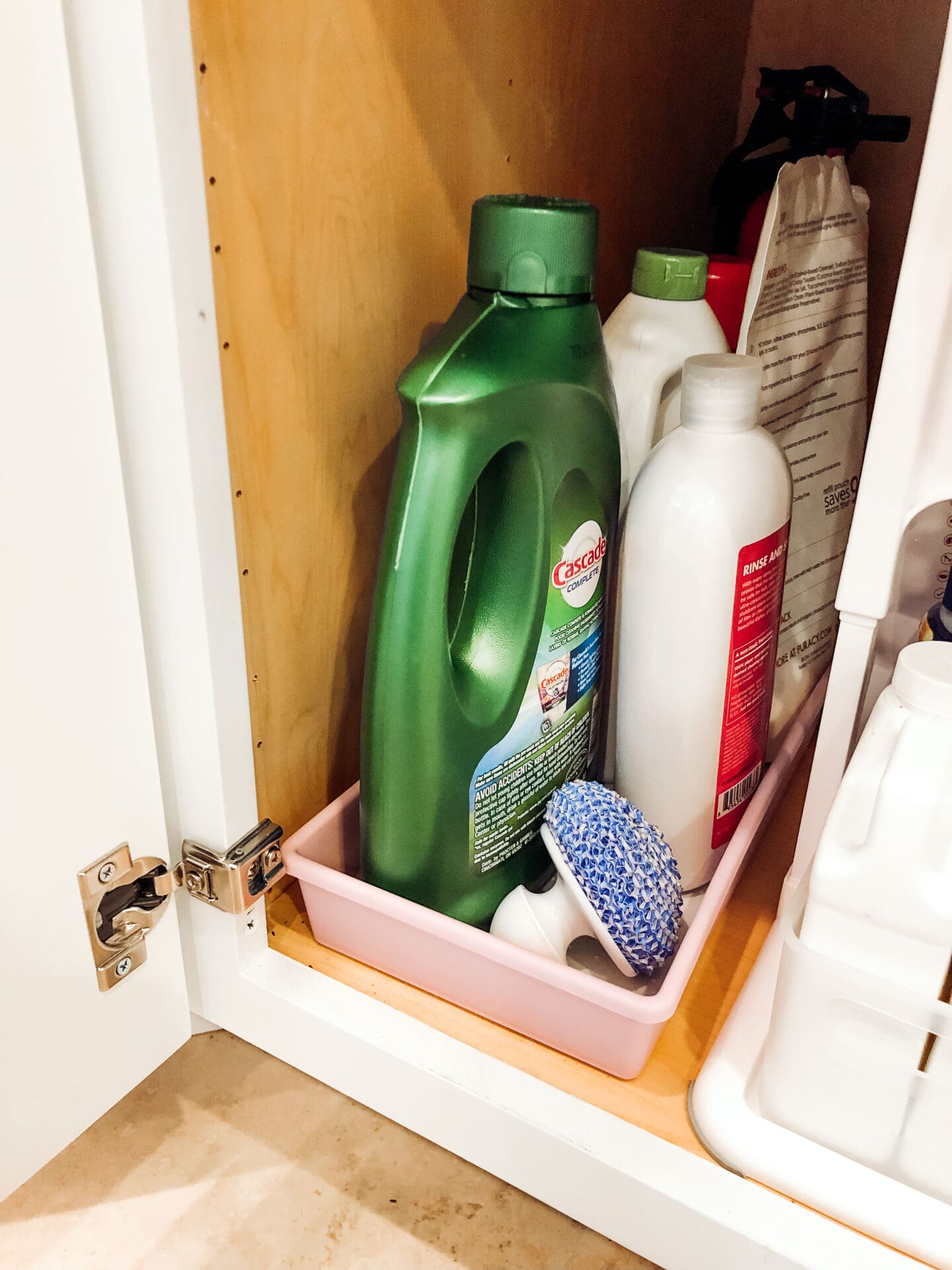 HOW TO ORGANIZE UNDER THE KITCHEN SINK - Jill Comes Clean