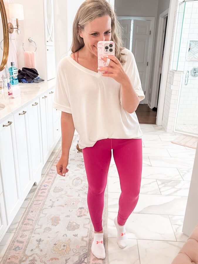 Photo showcasing soft and comfy leggings paired with an oversized tee. The leggings feature a buttery soft texture and a secure fit, perfect for workouts or lounging, while the oversized tee offers a breathable and stylish look, ideal for both casual wear and exercise.